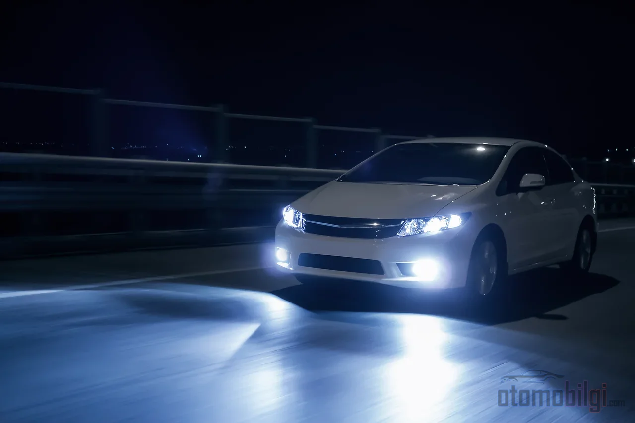 A small camera at the top of the windshield switches off the high beams for you the moment it detects an oncoming headlight.