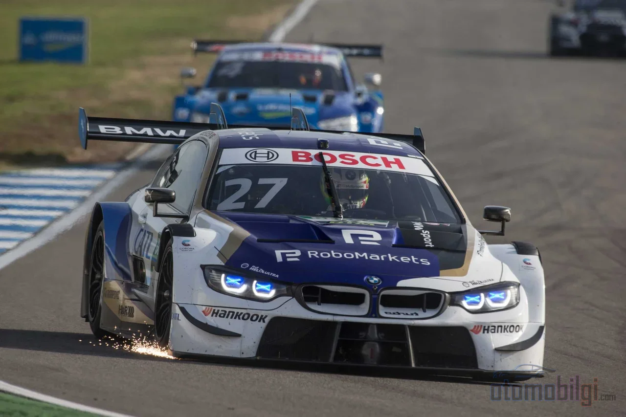In DTM, the winner is not determined by turbo boost pressure, but by weight and power adjustments calculated after a race; on-track equality is established at the table, not in the garage.