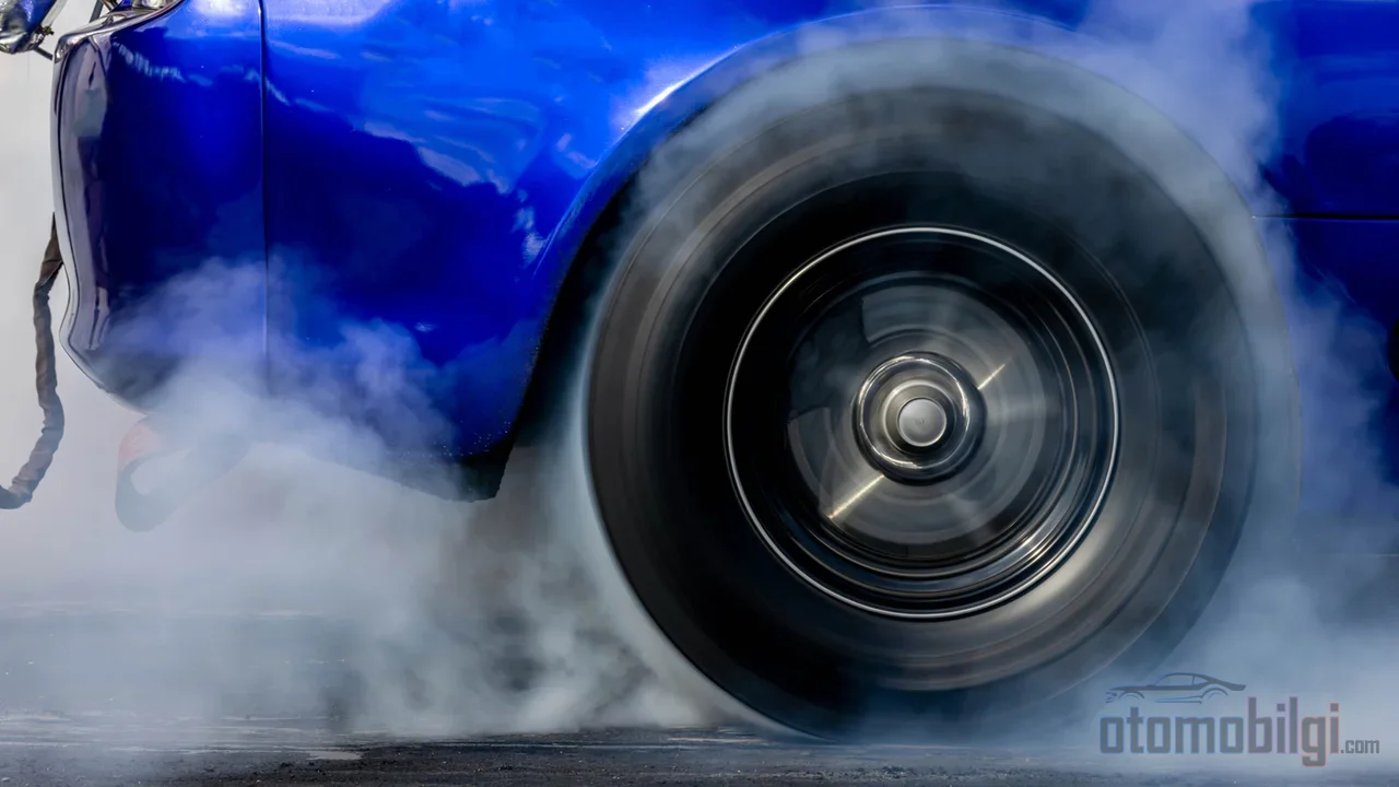 That smoke cloud isn't a show; rubber reaching 90 degrees is a silent physics calculation that wins races at the starting line.