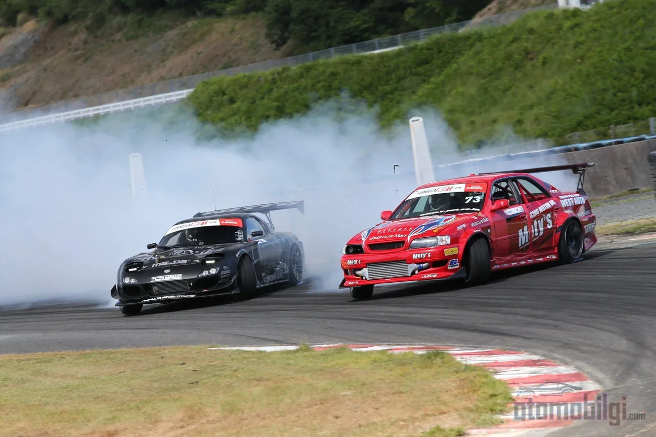 Drift is a dual passion that combines a rule-based racing discipline with the personal signature the driver lays down on the asphalt, all in the same tire mark.
