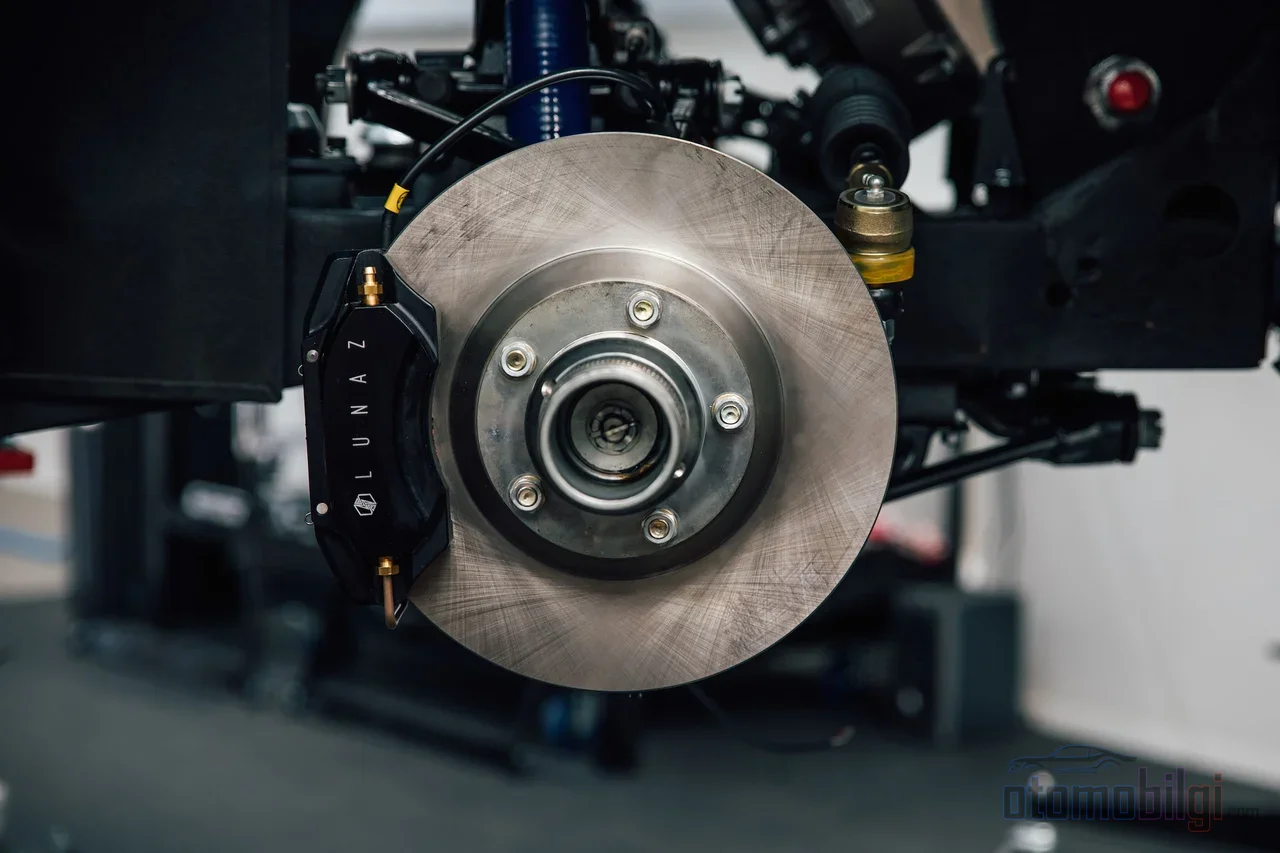 Regenerative braking recovers roughly half of the energy that would otherwise be lost as heat through friction, providing a 10-25% efficiency gain.