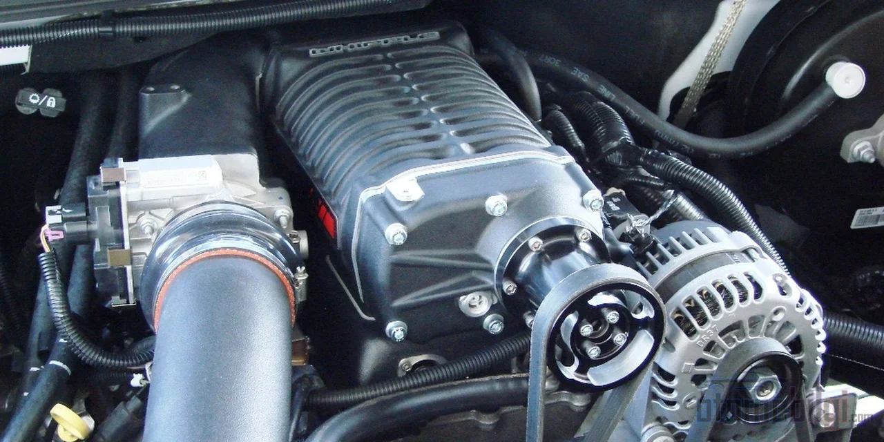A supercharger that draws power from the crankshaft extracts more power from the same displacement without ever experiencing that lag that a turbocharger causes.