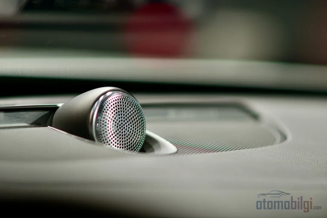 The difference isn't the number of speakers, it's the DSP calibration tailored to the cabin; as road noise rises, the advantage of premium sound quickly evaporates.