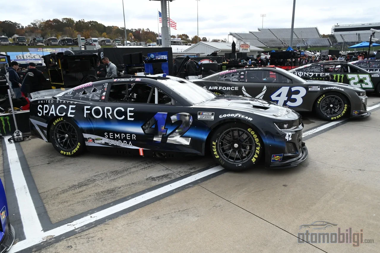 The Chevrolet or Ford logo on the body is merely an illusion; modern NASCAR cars are pure racing machines built from scratch by hand.