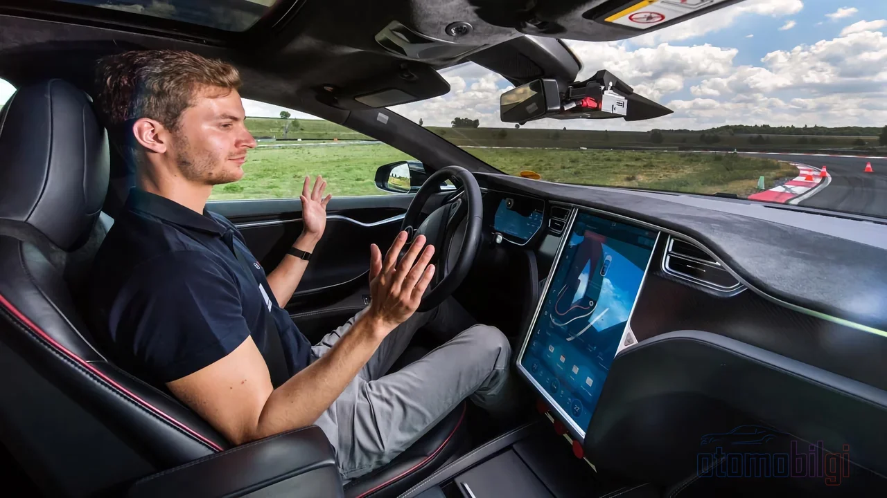 Because the car cannot yet read the road by itself, cameras now monitor the eye blinks and attention of the person behind the wheel second by second.