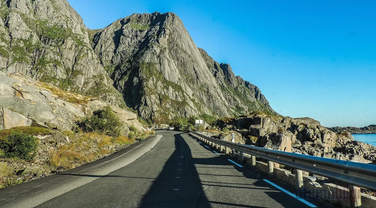On a sustained climb, the hybrid's advantage narrows, because the battery cannot carry the load of lifting the vehicle's weight hundreds of meters uphill on its own for long.
